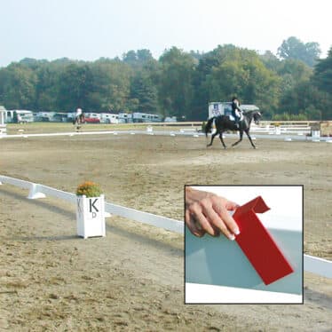 horse riding in a dressage arena