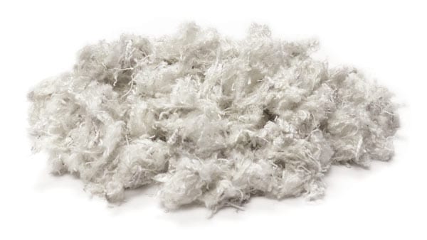 pile of ArenaAid fibers for horse arena footing