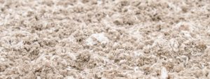 shredded carpet mixed with sand
