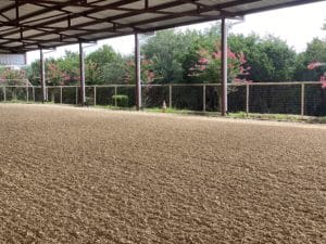 horse arena footing in a covered arena