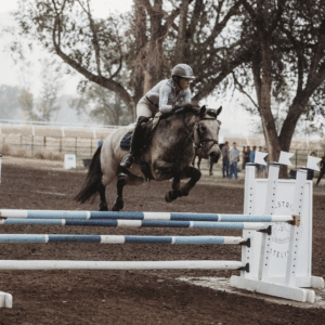 Molly and her horse jumping