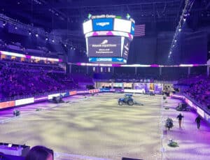 tractor in indoor dressage arena competition