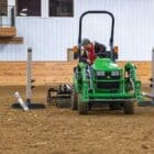 Arena Groomer being pulled by a tractor