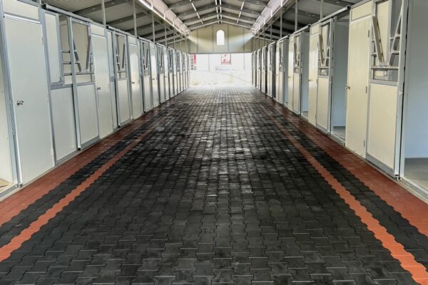 rubber paver bricks in barn aisle