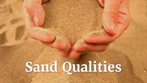 Hands holding fine quality sand