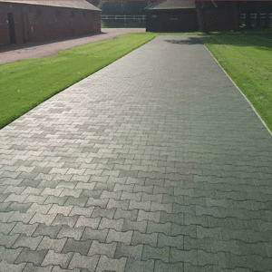 Black rubber pavers line a large walkway
