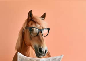 horse reading newspaper