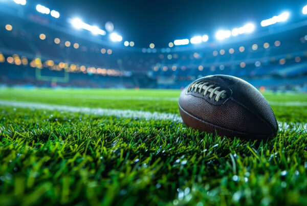 footbal laying on a football field