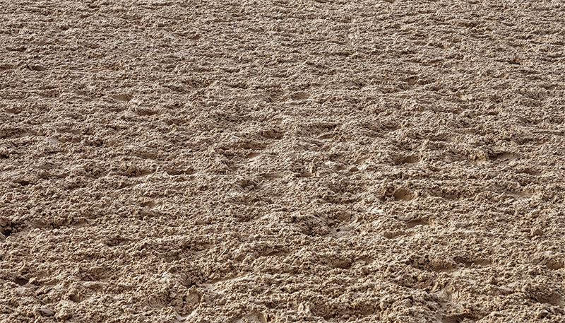 horse arena sand with hoof prints
