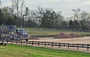 piles of sand in horse arena